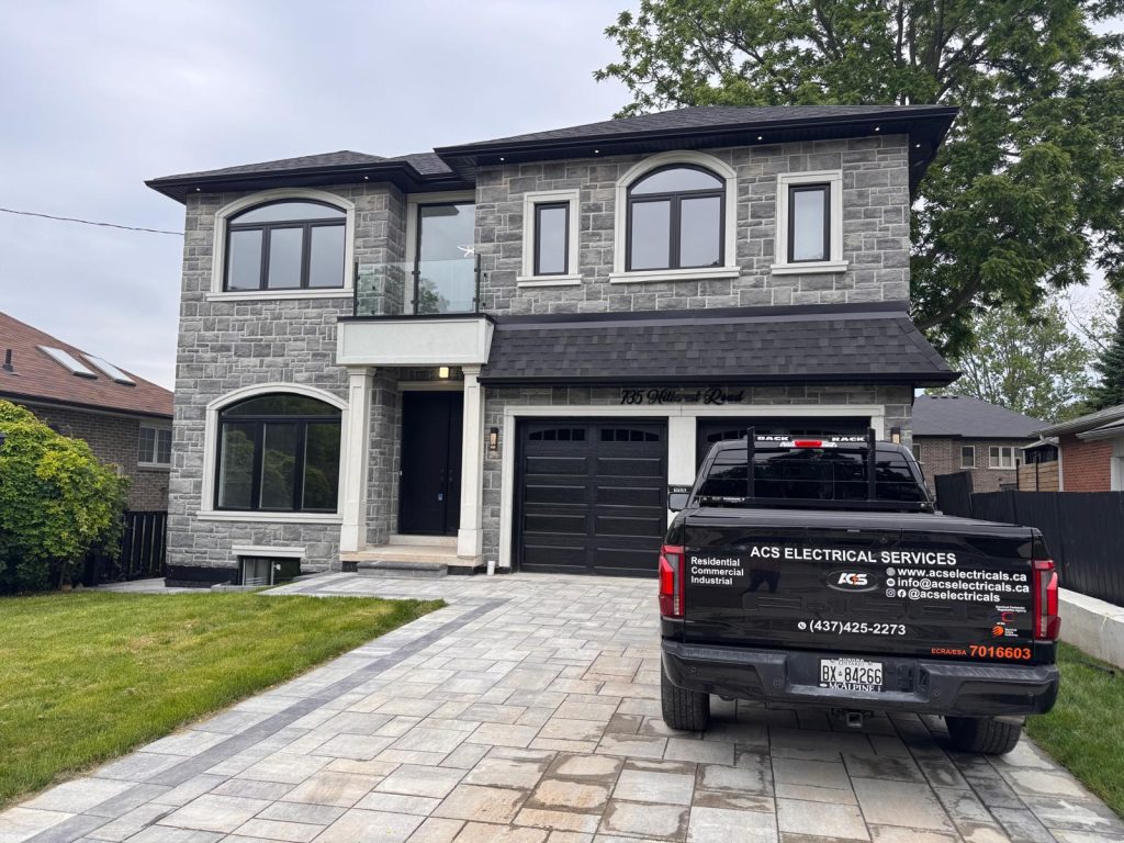 ACS Electricals licensed electrician truck outside a completed residential project in the Greater Toronto Area